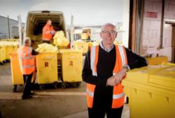 Medisort Managing Director Stuart Brittle pictured at its HQ with fleet